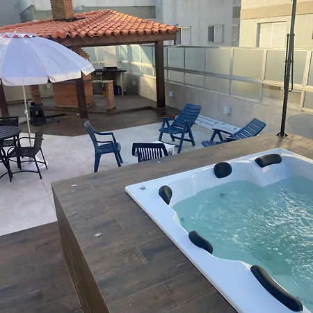 Cobertura Guaruja Apto Com Jacuzzi E Churrasqueira Exterior photo